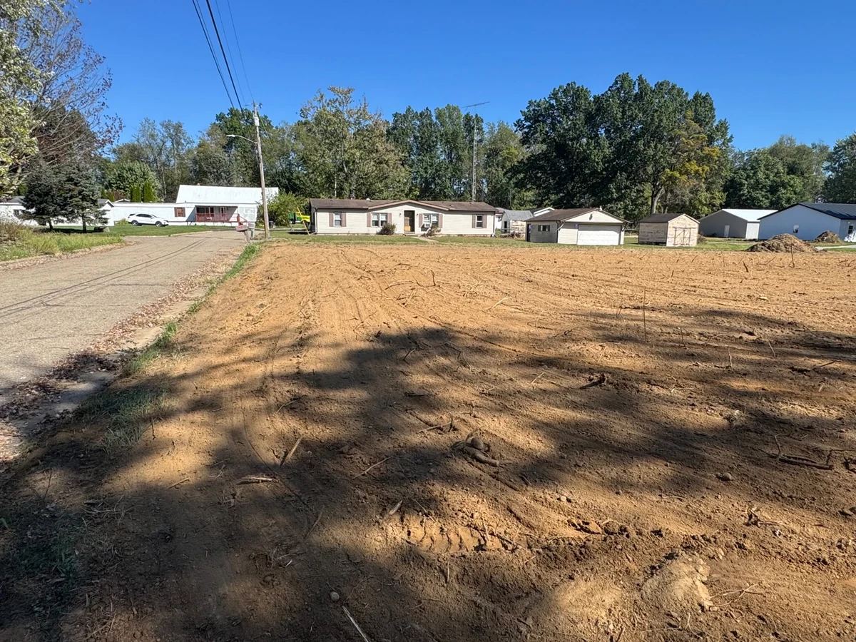 Residential lot with exposed ground after vegetation removal
